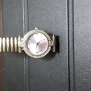 Gold link pink face watch